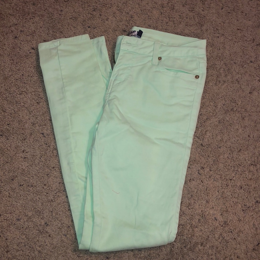 Pastel green skinny jeans
